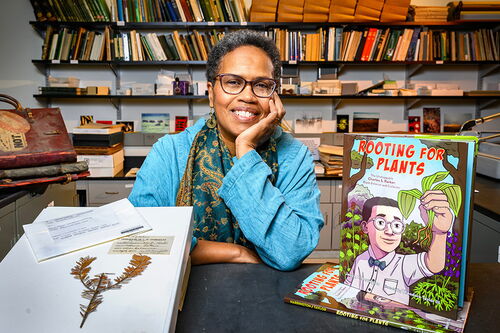 Janice Harrington displaying new book