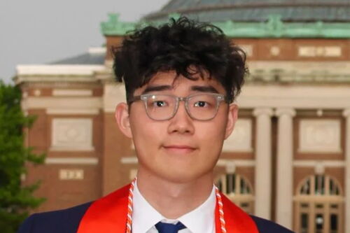 Frank Cui in graduation regalia 