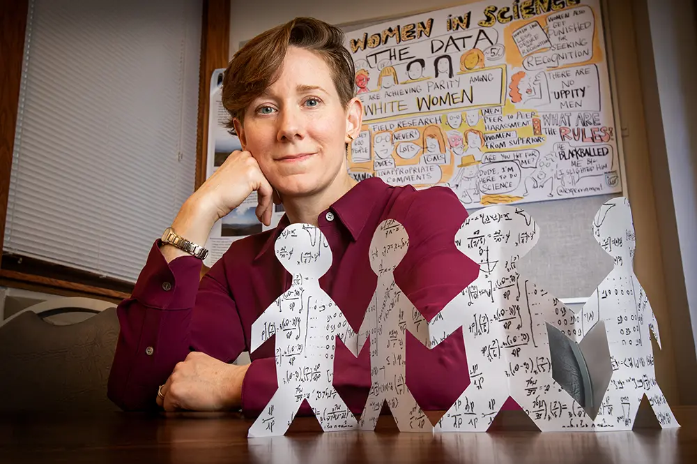Kathryn Clancy at desk