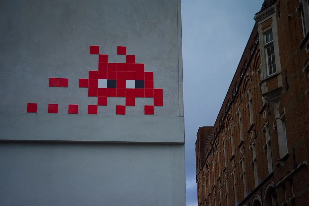 Space invaders art on a wall