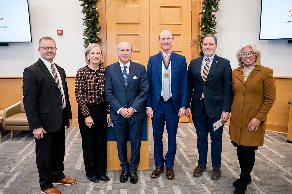 From left: Dan Shike, interim department head of the Department of Animal Sciences; Sara M. Kelley and Keith W. Kelley, donors of the endowed professorship; Erik K. Nelson, Keith W. and Sara M. Kelley Endowed Professor of Immunophysiology; Germán Bollero, dean of the College of ACES; and Amy Santos, associate provost for faculty development.