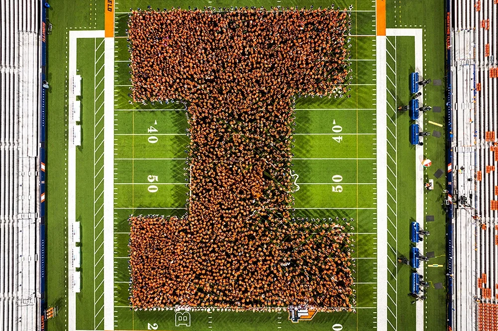 Students forming a Block I on the football field
