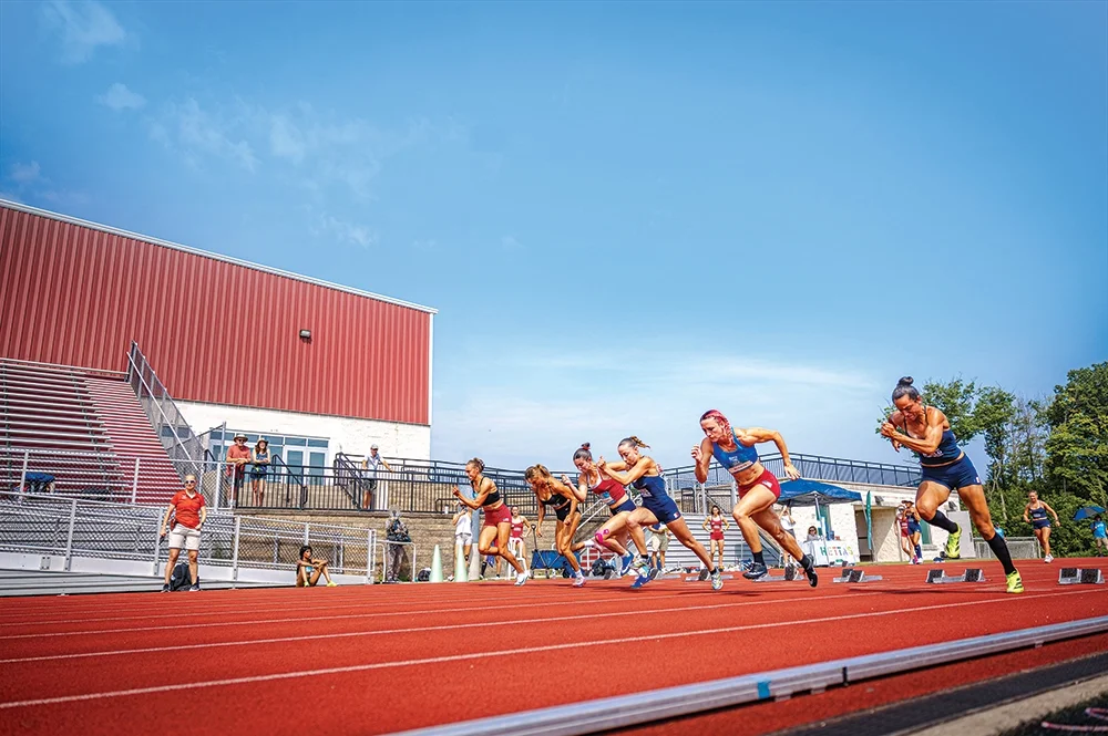 women running on track