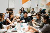 Students at iVenture discuss their startup