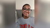 LAS student records video in a gray Illinois sweathshirt