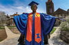 Alma Mater in graduation attire