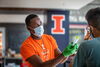 Worker explains saliva test