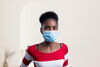 Teenager wearing a mask