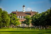 the Illini Union in the distance, with the green grass and trees of the Quad in the foreground
