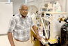 Satish Nair standing in a laboratory