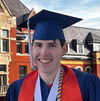 GGIS alum Jason Segal in his blue cap and gown for graduation