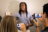 Ayo Dosunmu being interviewed