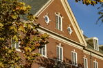 A photo of Gregory Hall in the fall.