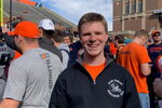 LAS student poses for photo inside Memorial Stadium