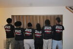 students with their backs to the camera, the back of their t-shirts reading "you can never go wrong when it's write"