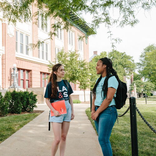 Students talk outside Lincoln Hall